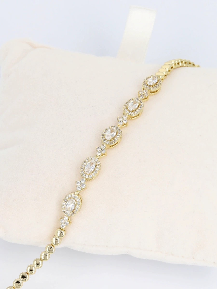 Bransoleta damska pozłacana z owalnymi cyrkoniami 